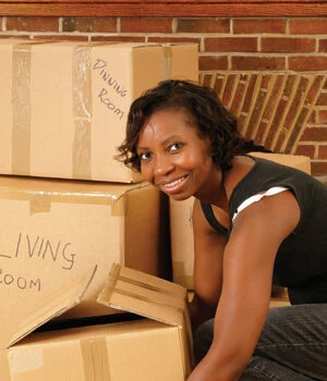 women with moving boxes.