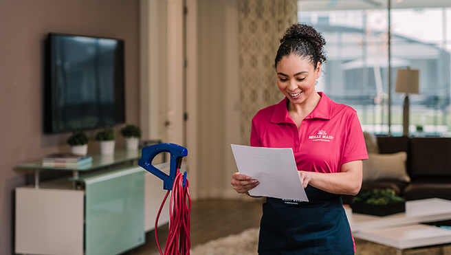 A Molly Maid employee cleaning a customer’s home in Vancouver, WA.