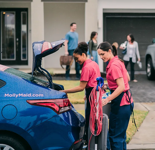 Maid providing a home cleaning service.