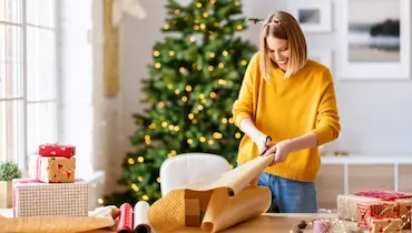 Use double-sided tape and four other expert tips to wrap presents like a  pro (and save money!) this Christmas