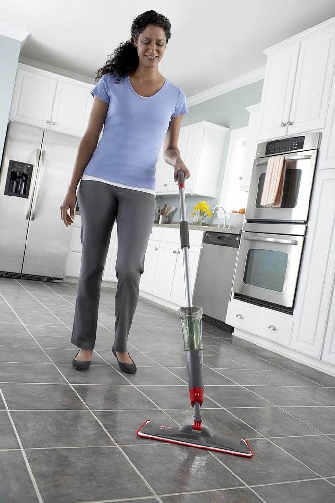https://www.mollymaid.com/us/en-us/molly-maid/_assets/expert-tips/images/woman-with-spray-mop-600.webp