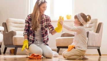 Woman and child cleaning