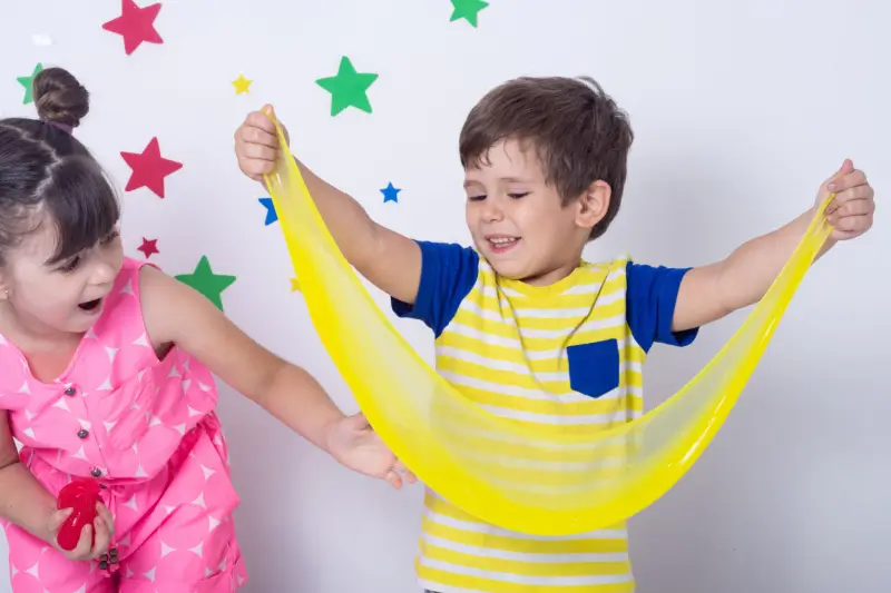 Children playing with homemade slime.