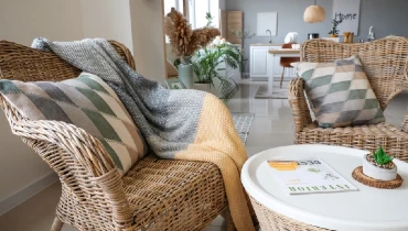 Interior of a modern living room with wicker furniture