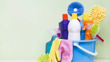 House cleaning supplies in a bucket