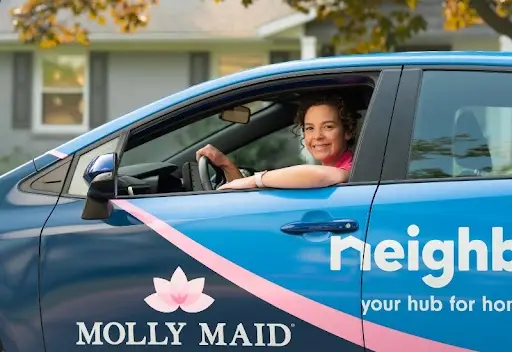 Molly Maid professionals arriving to perform cleaning services near you